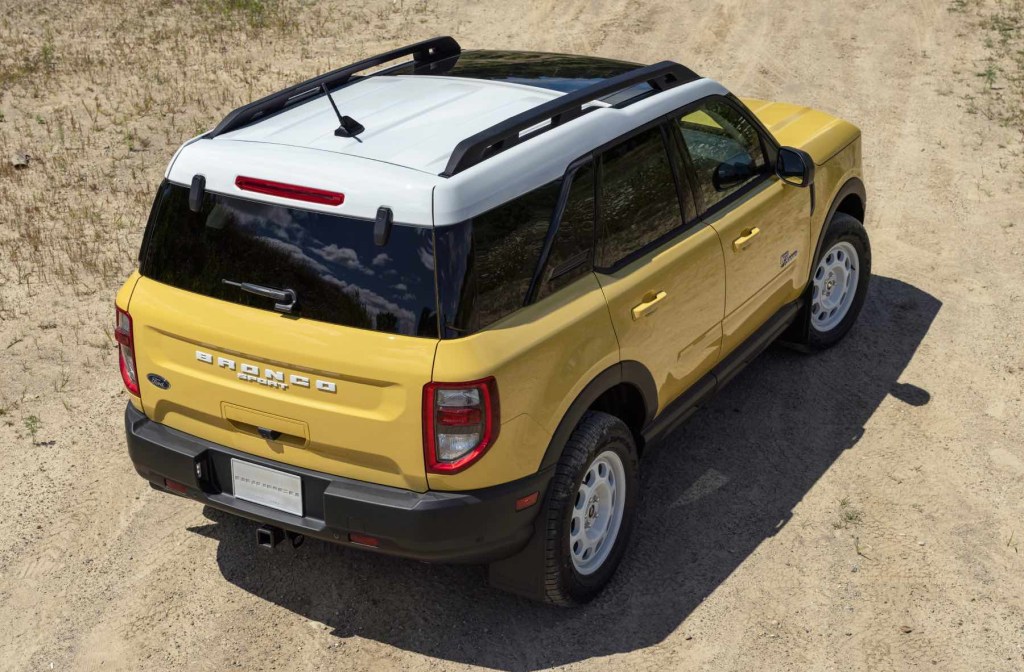 The back end view of a yellow 2023 Ford Bronco Sport Heritage Limited Edition. 