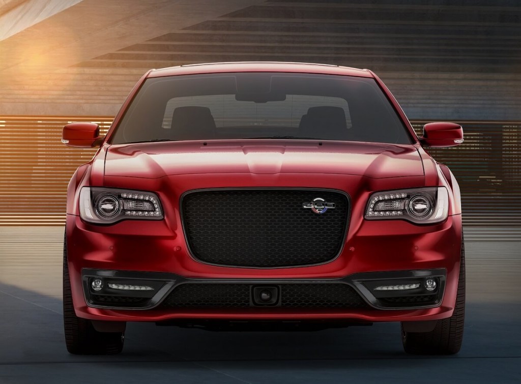 A red 2023 Chrysler 300C shows off its front-end styling. 