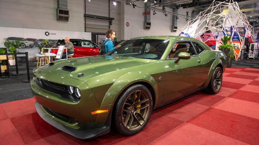 Green 2023 Dodge Challenger SRT Hellcat performance muscle car at Brussels Expo