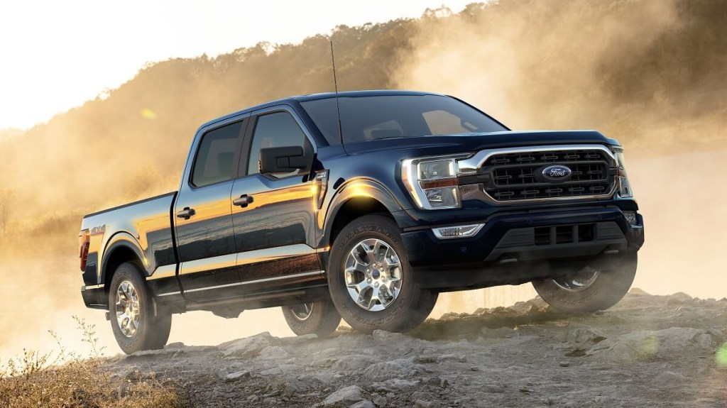 The 2023 Ford F-150 off-roading over rocks 