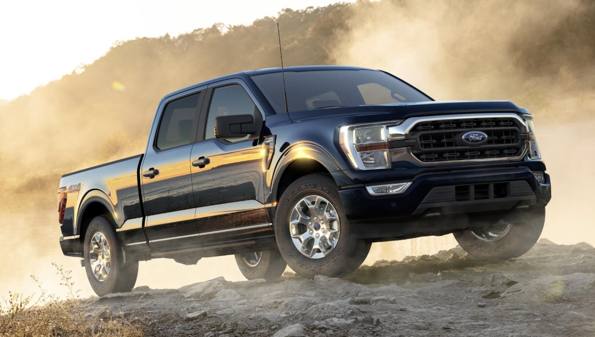 The 2023 Ford F-150 driving in dirt and gravel
