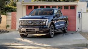 The 2023 Ford F-150 Lightning charging at home