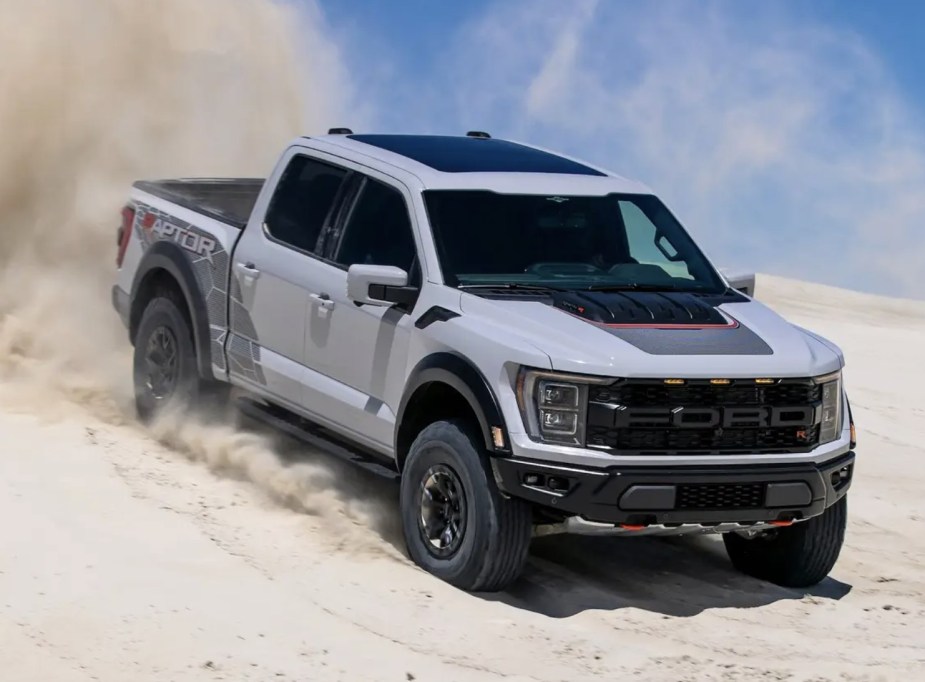 Ford F-150 Raptor R bombing a dune. This is one of the most expensive pickup trucks on the market.