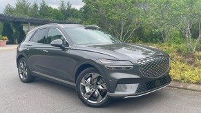 The 2023 Genesis Electrifed GV70 parked near plants