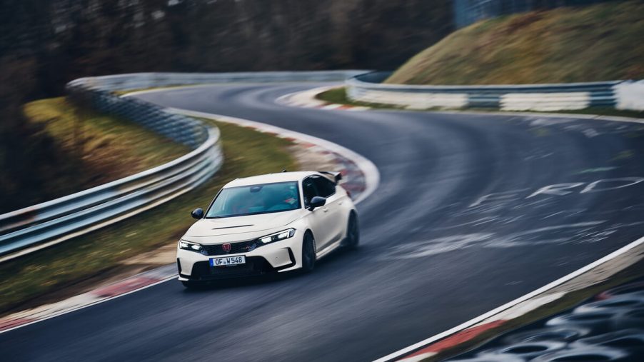 A front view of the 2023 Honda Civic Type R on a race track.
