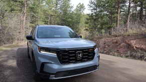 2023 Honda Pilot TrailSport front view on the trail