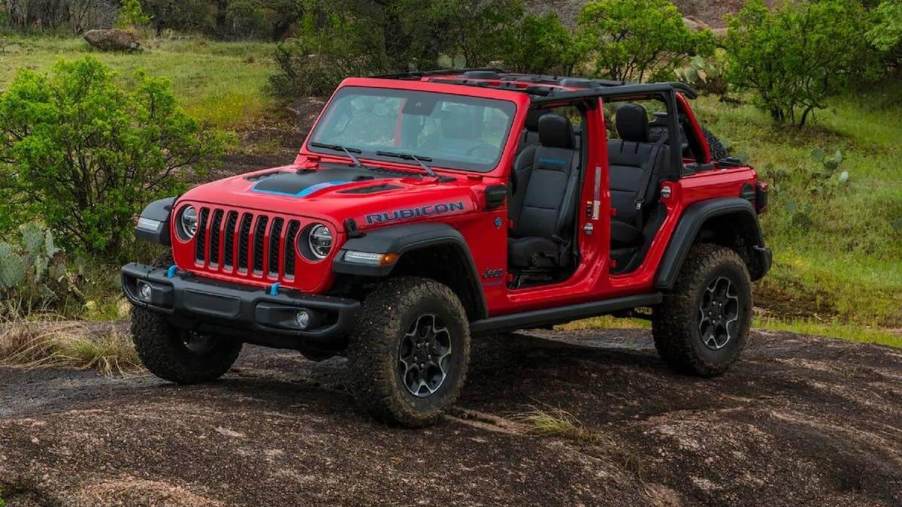Red 2023 Jeep Wrangler 4xe hybrid off-road