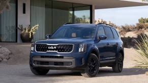 The 2023 Kia Telluride parked in front of a home