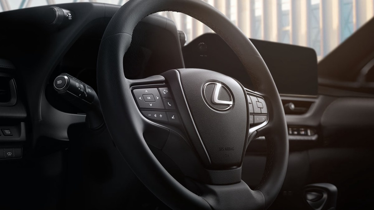 An interior shot of a Lexus steering wheel.