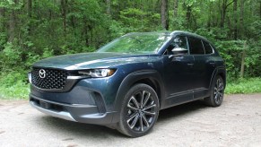 The 2023 Mazda CX-50 off-roading on a dirt trail