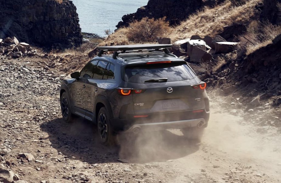 The Mazda CX-50 off-roading in dirts and rocks