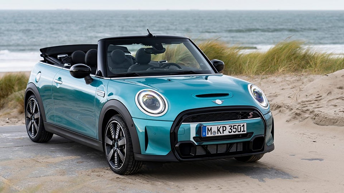 Teal 2023 Mini Convertible at the beach - This little car faces the fewest projected safety recalls