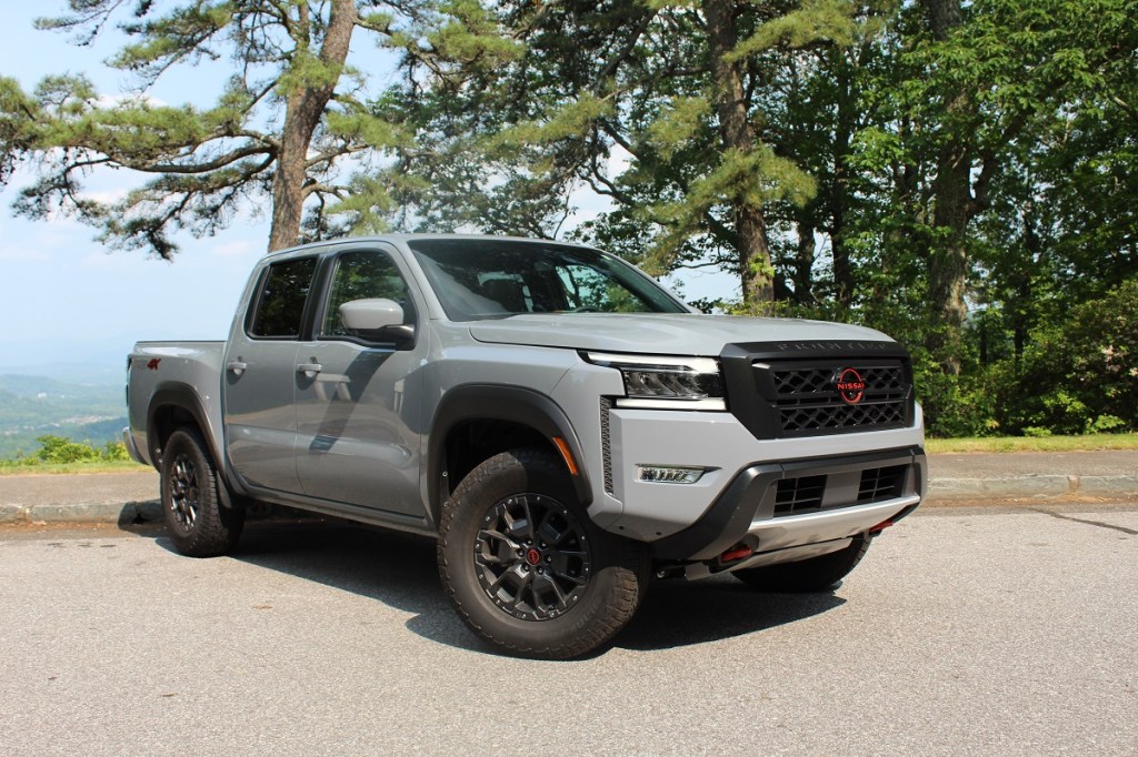 The 2023 Nissan Frontier Pro-4X parked near trees