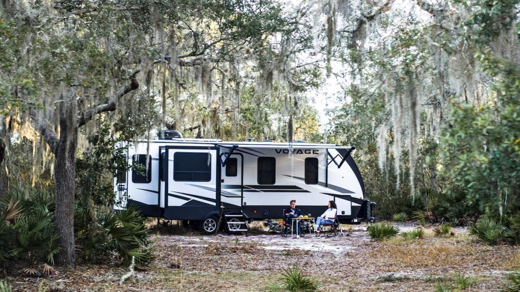 A Winnebago Voyage towable RV in the Florida backcountry
