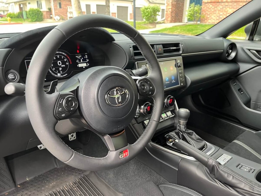 The interior view of the 2023 Toyota GR86 with an automatic transmission.