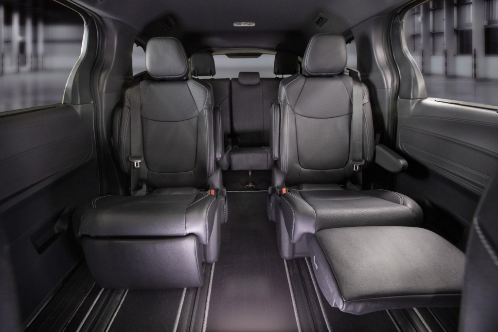A view into the back two rows of the 2023 Toyota Sienna. Its three-row design is as spacious as any Toyota SUV.