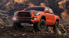 The 2023 Toyota Tacoma off-roading over rocky terrain