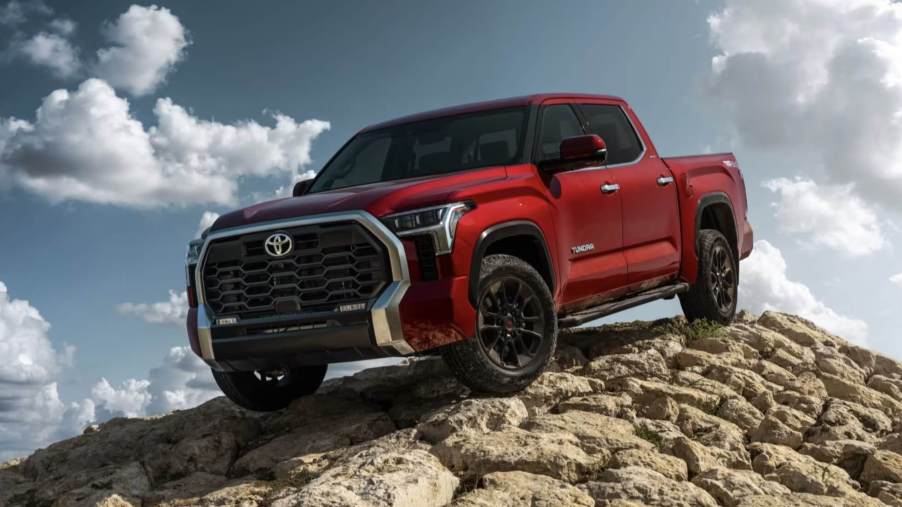 The 2023 Toyota Tundra off-roading over rocks