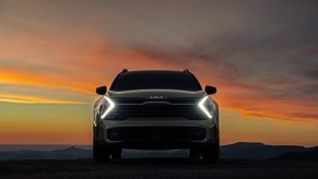 A 2023 Kia Sportage parked at sunset