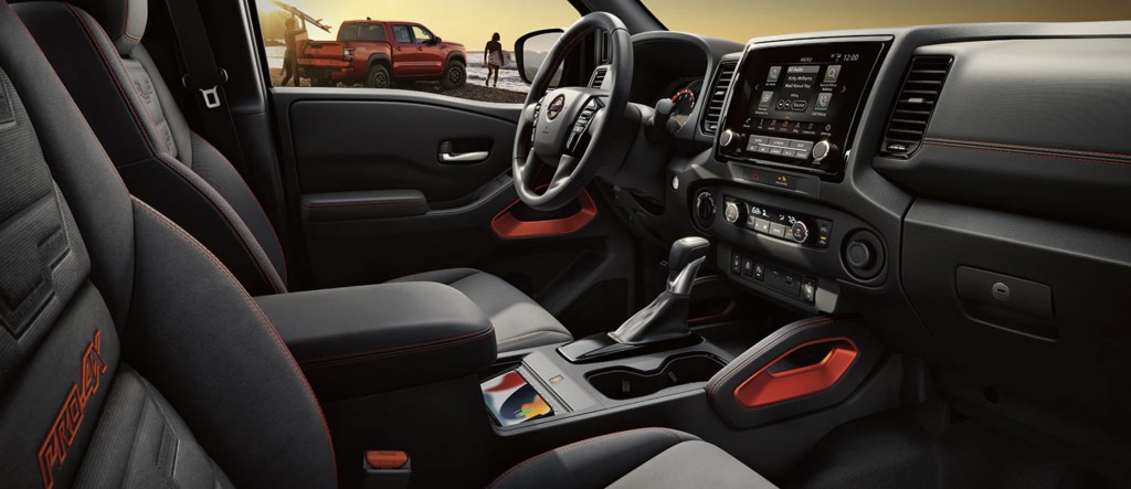 The 2024 Nissan Frontier Pro-4X interior with lava red accent stitching 