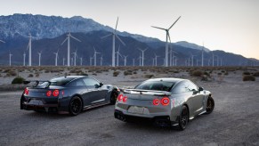 A Nissan GT_R NISMO and a T-Spec car parked next to each other