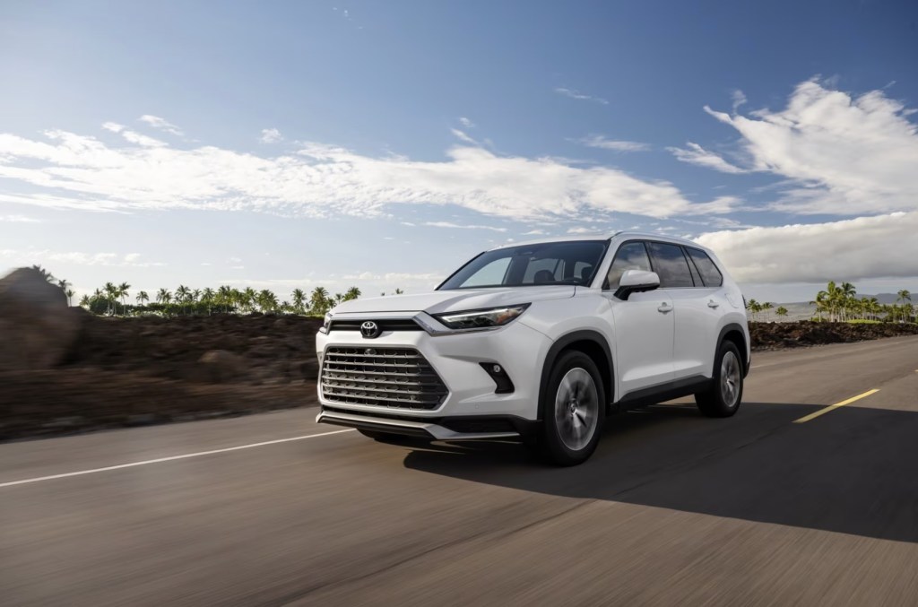 The 2024 Toyota Grand Highlander driving down the road