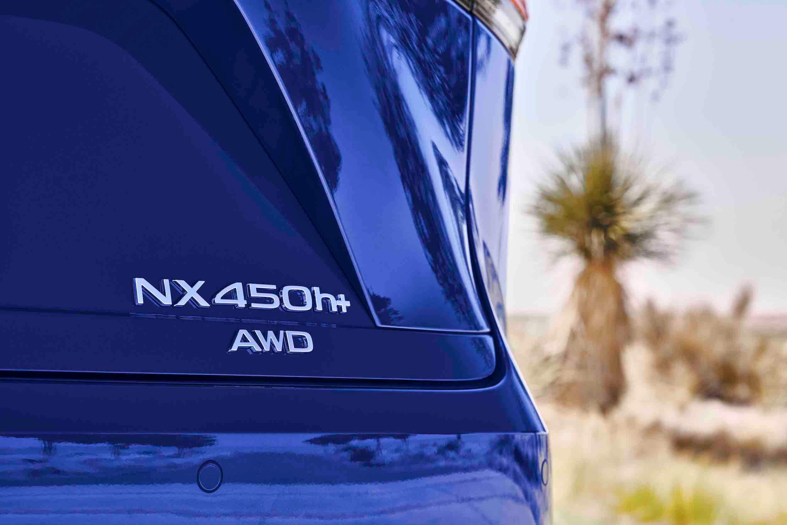 The 2023 Lexus NX 450h+ rear badge in blue already looks good, and the 2024 model that's pictured will take it to another level.
