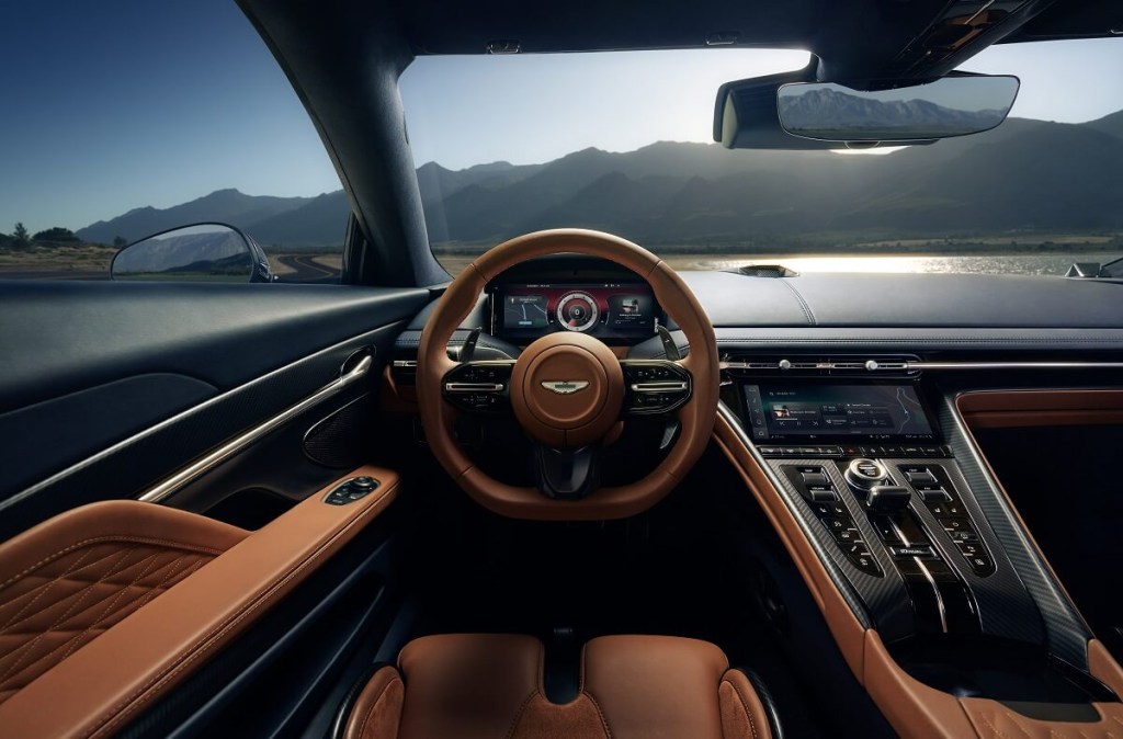 The new Aston Martin DB12 interior shows off its Super Tourer materials like leather and carbon fiber.