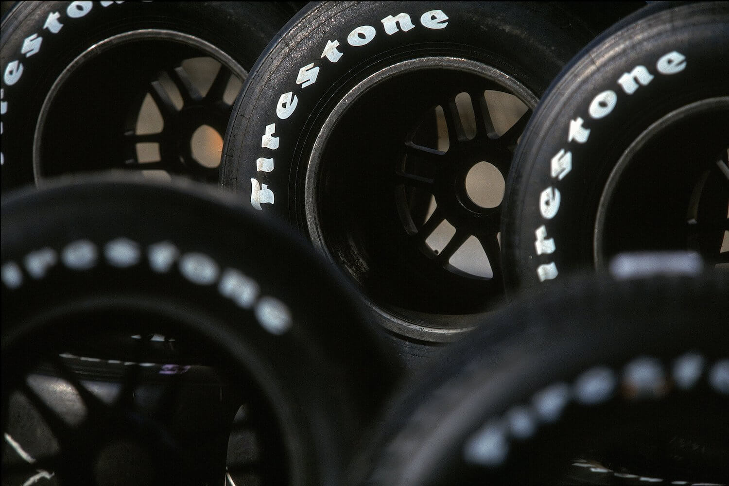 Firestone racing tires lined up at the Firestone Grand Prix in Monterrey California.