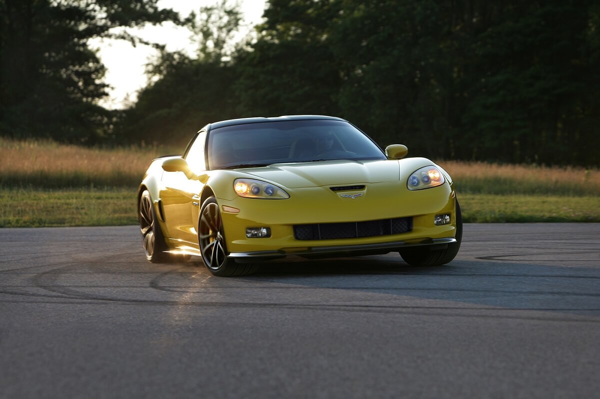A yellow C6 Corvette Z06 shows off its front-end styling. 