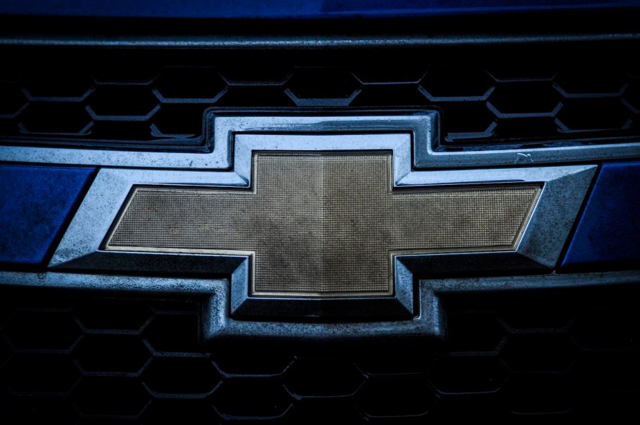 The bowtie logo of Chevrolet, on the grille of a General Motors car.