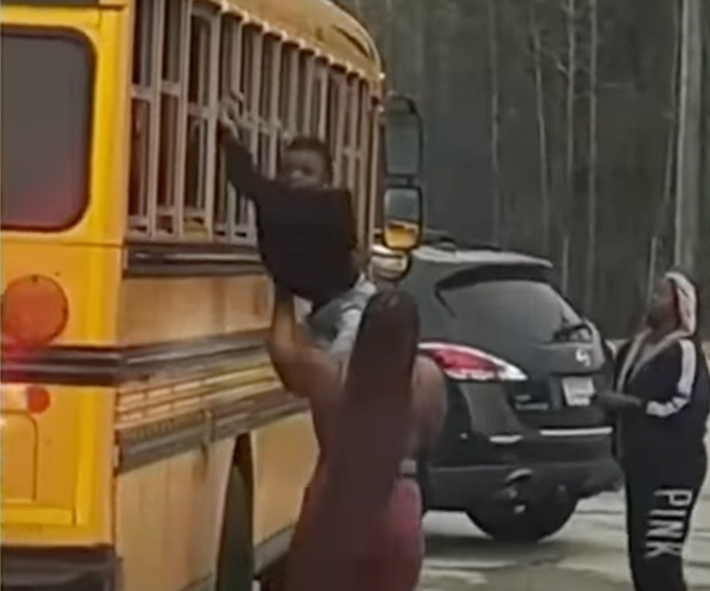 Child climbs out of window of school bus in Paulding County, Georgia