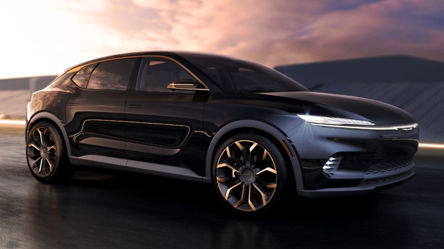 The Chrysler Airflow EV concept drives at twilight in this rendering.