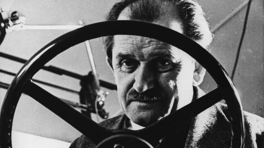 Ferdinand Porsche (1875–1951), the designer of the first hybrid car, behind the wheel of one of his creations