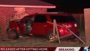 Ford Explorer SUV crashed into woman’s bedroom in Oklahoma City, knocking her off the bed