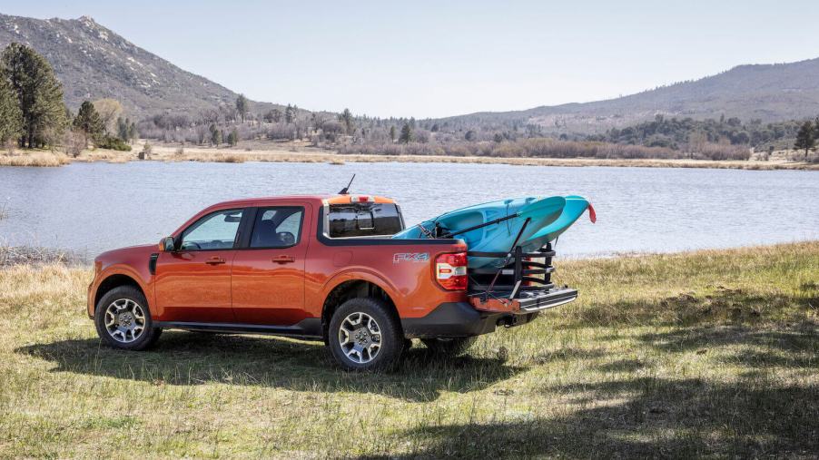 The Ford Maverick parked in front of a lake. The 2023 Maverick is potentially a better buy than the 2023 Ford Ranger.