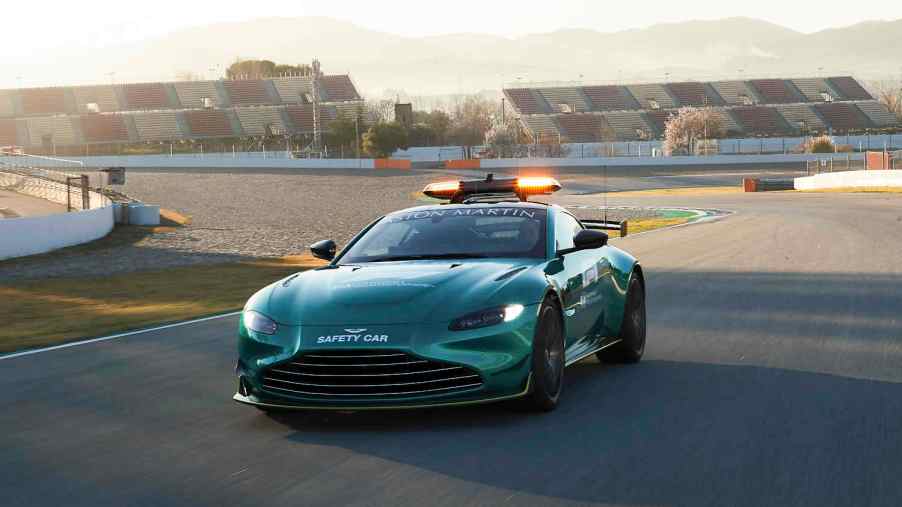 The Aston Martin Formula 1 safety car on the track, with the the Vantage F1 Edition available off-track