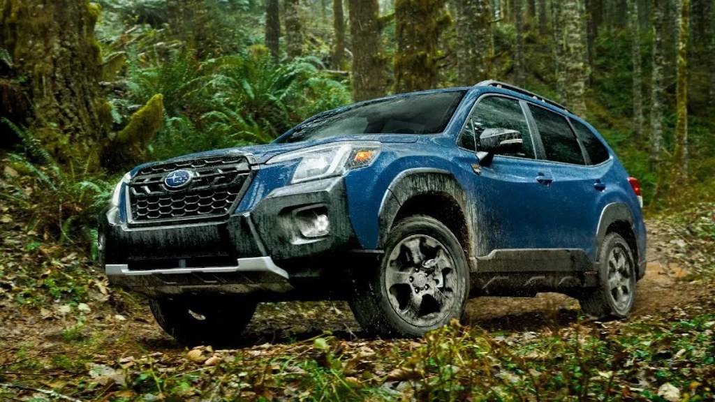 Front angle view of blue 2023 Subaru Forester Wilderness off-road compact SUV