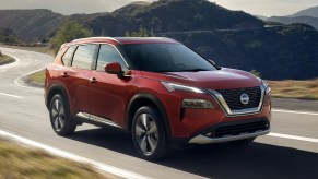 Front angle view of red 2023 Nissan Rogue compact SUV