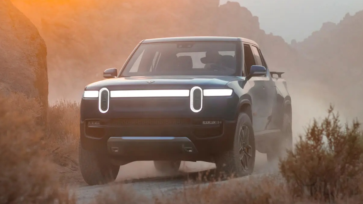 Front view of 2023 Rivian R1T, best electric truck, not Ford F-150 Lightning, Tesla Cybertruck, or Chevy Silverado EV