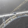 Hennessey Venom F5 Roadster crossing a bridge.