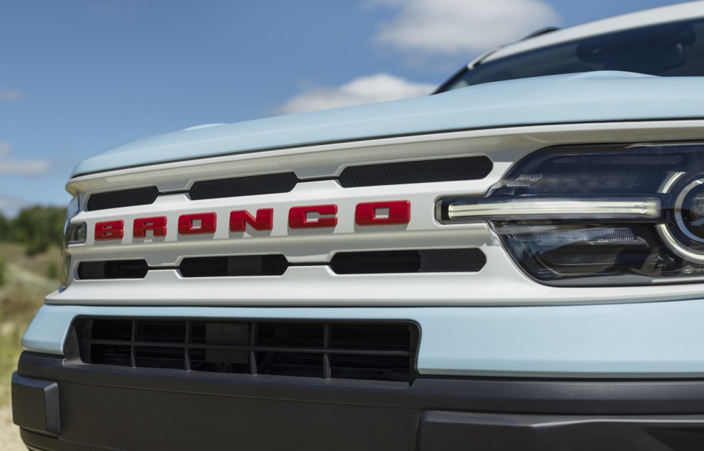 The front grille of the 2023 Ford Bronco Sport with red Bronco badging. The new 2024 Bronco may have different appearance options once it's available to order.