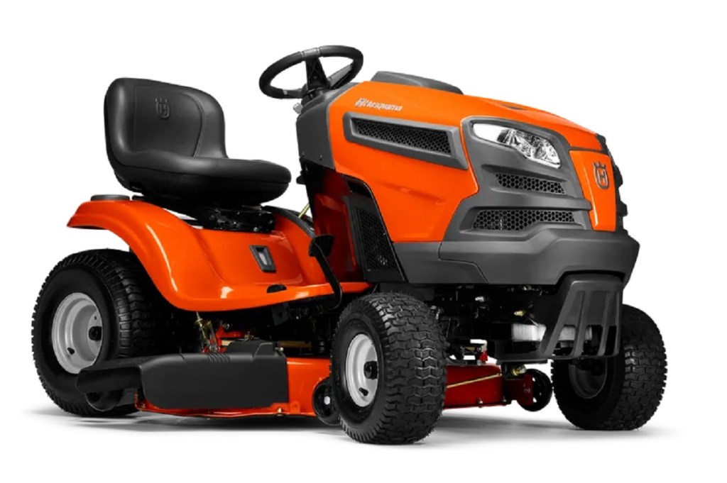 The Husqvarna YTH18542 riding lawn mower shows off its orange paint. 