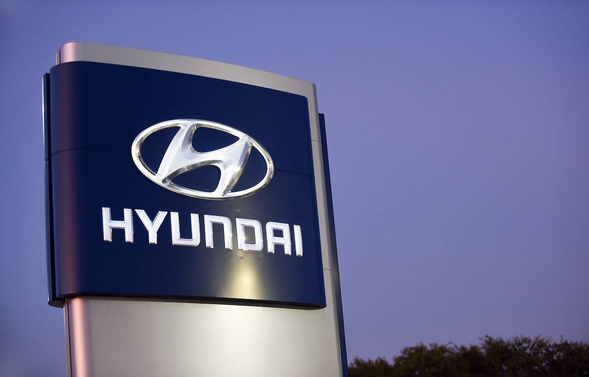 The Hyundai logo on a sign