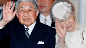 Japanese Emperor Akihito (L) and Empress Michiko (R) arriving at Ujiyamada Station to visit Jingu shrine
