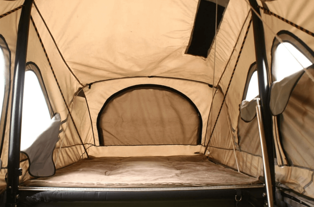 inside the roof-top tent on the Jeep Wrangler camper.
