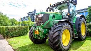 John Deere tractor sitting on grass