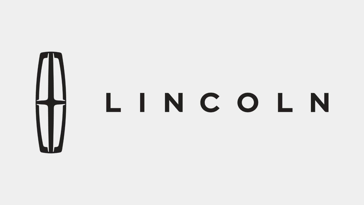 Black text of the Lincoln luxury car brand logo on a gray background