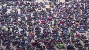 15,000 motorcycle riders showing support for boy with terminal cancer at biker rally in Germany