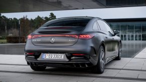 Rear exterior of a gray Mercedes-Benz EQE outside